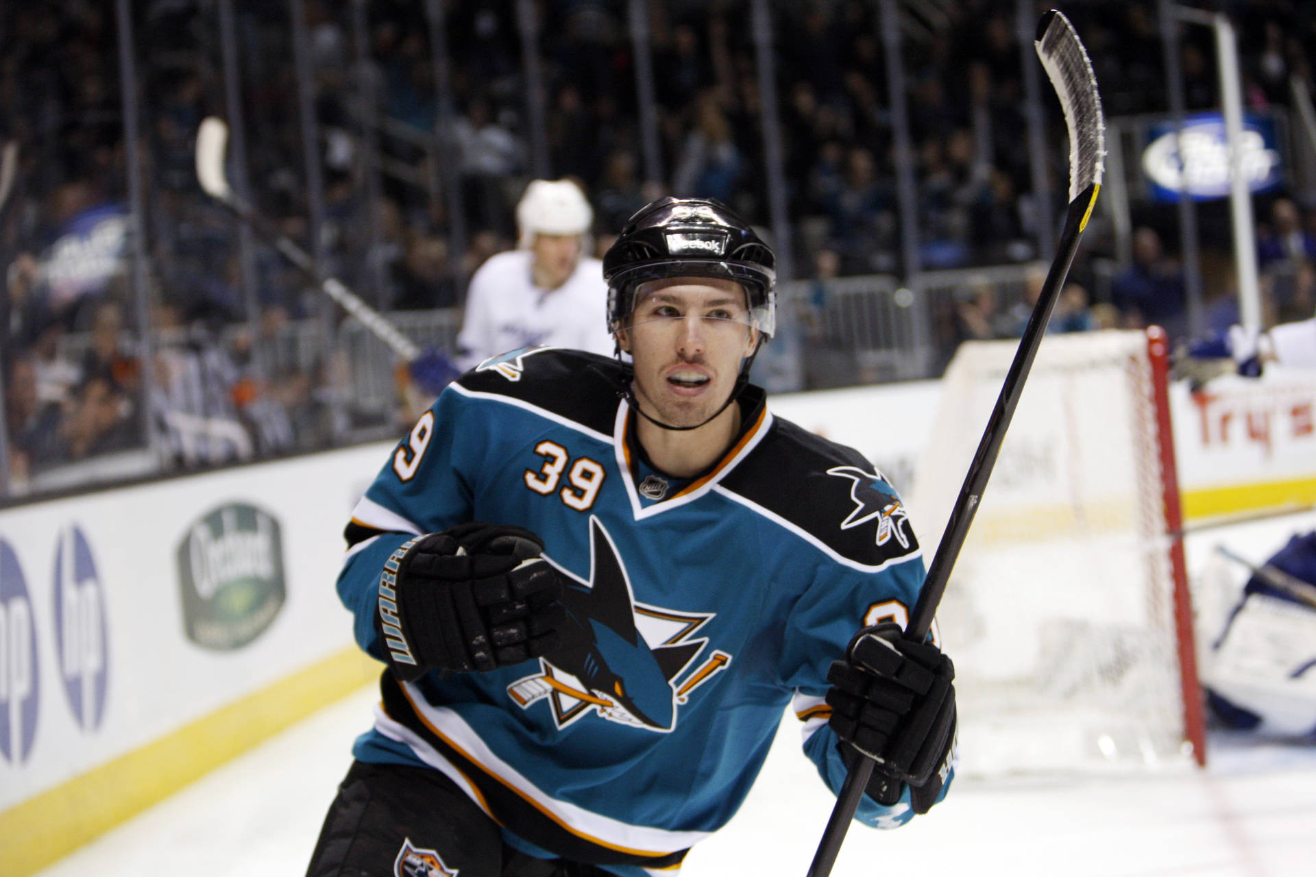 Professional Ice Hockey Center Logan Couture Background