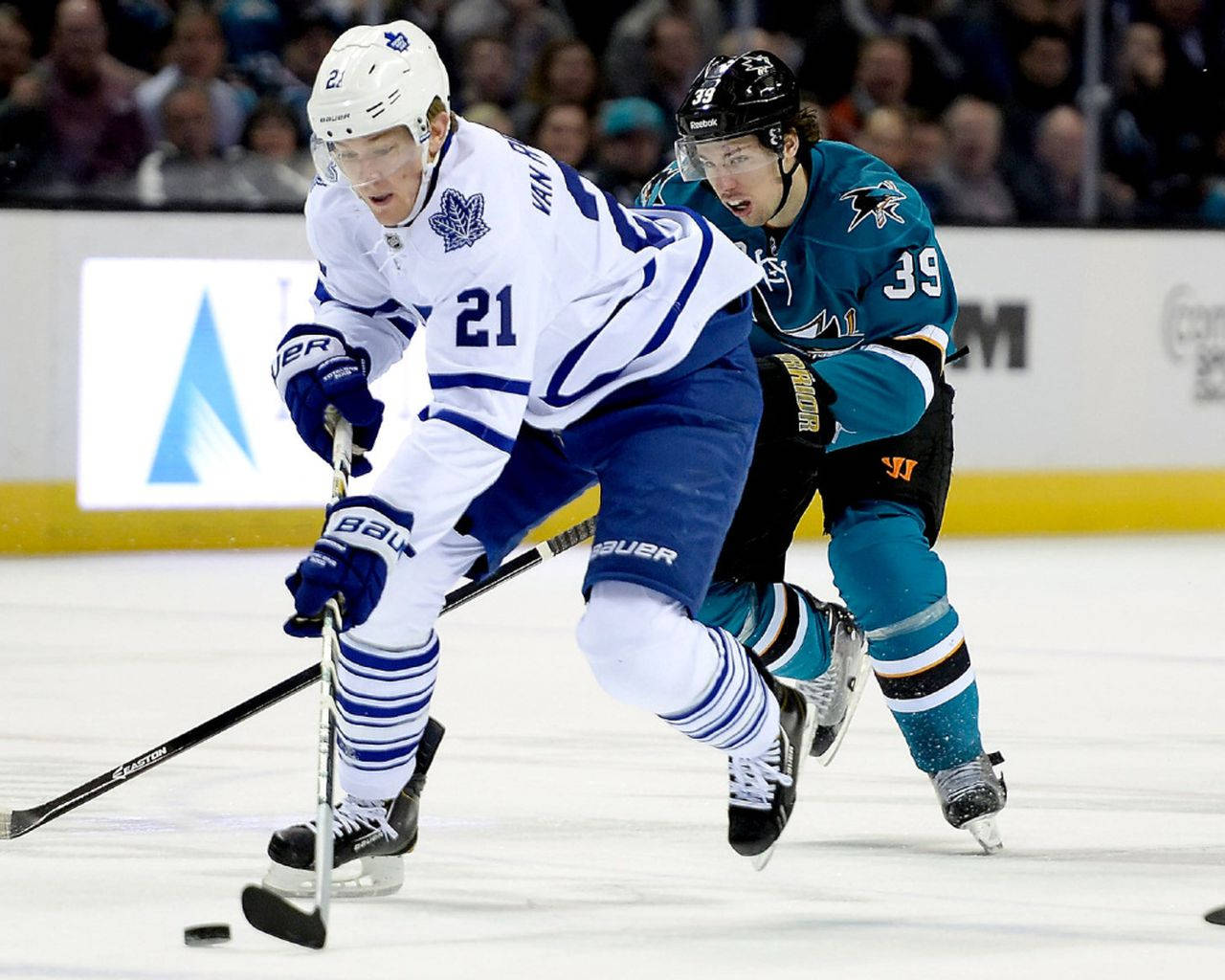 Professional Ice Hockey Player James Van Riemsdyk In Action Background