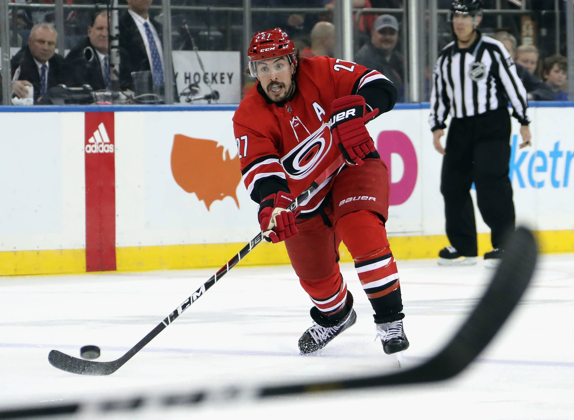 Professional Ice Hockey Player Justin Faulk In Action Background