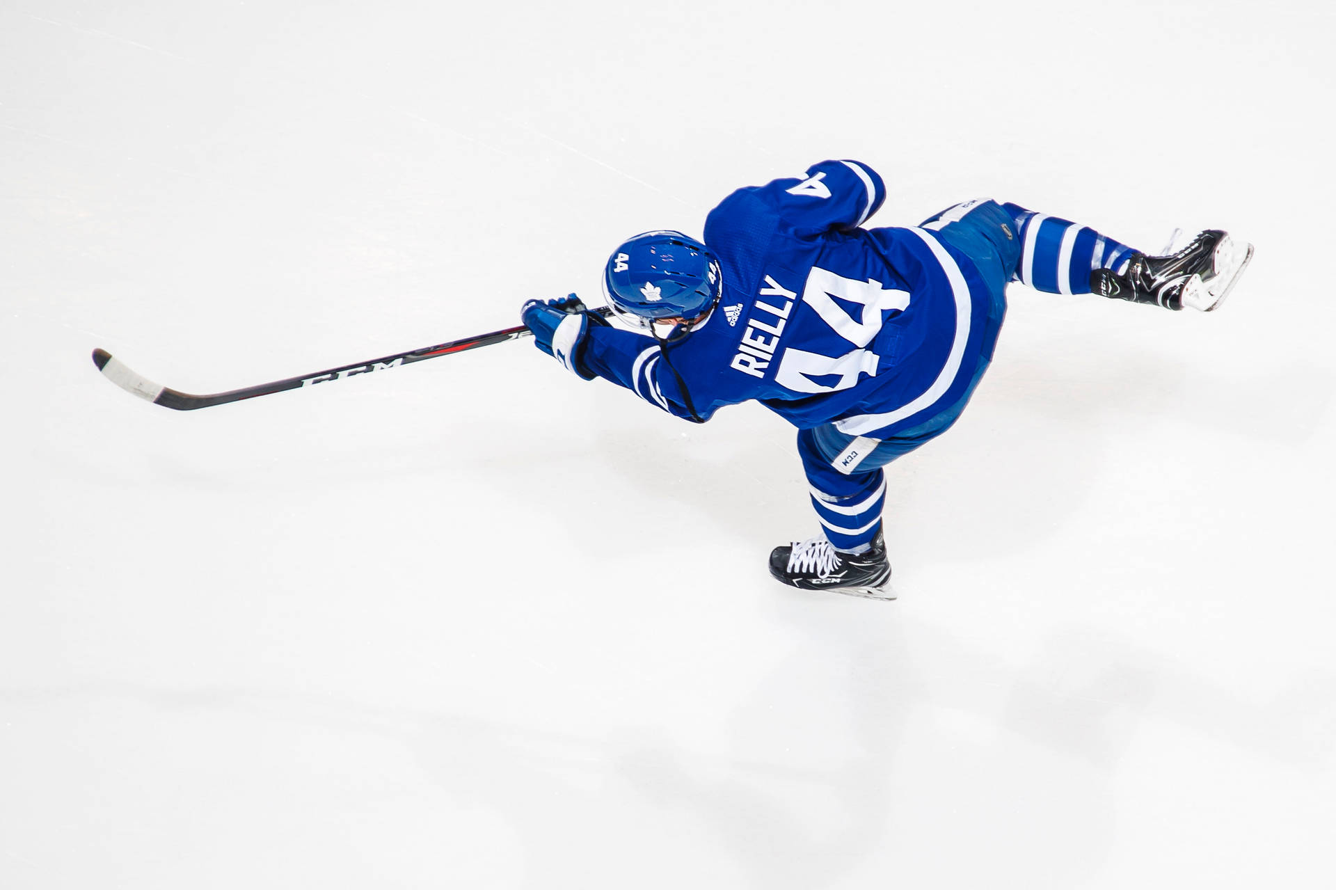 Professional Ice Hockey Player Morgan Rielly In Action Background