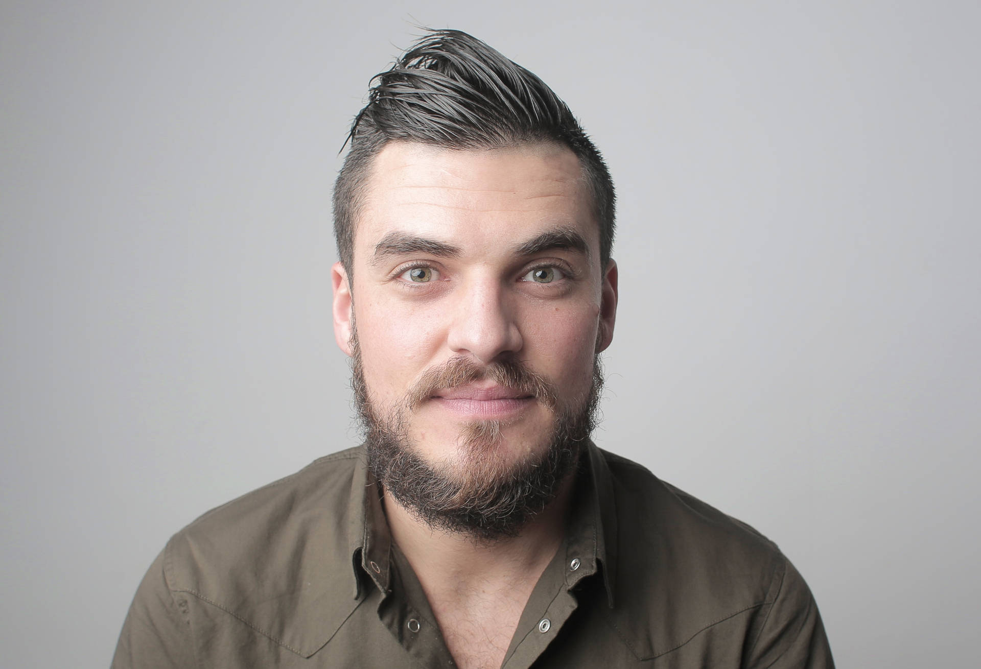 Professional Man In Brown Button-up Shirt Headshot Background