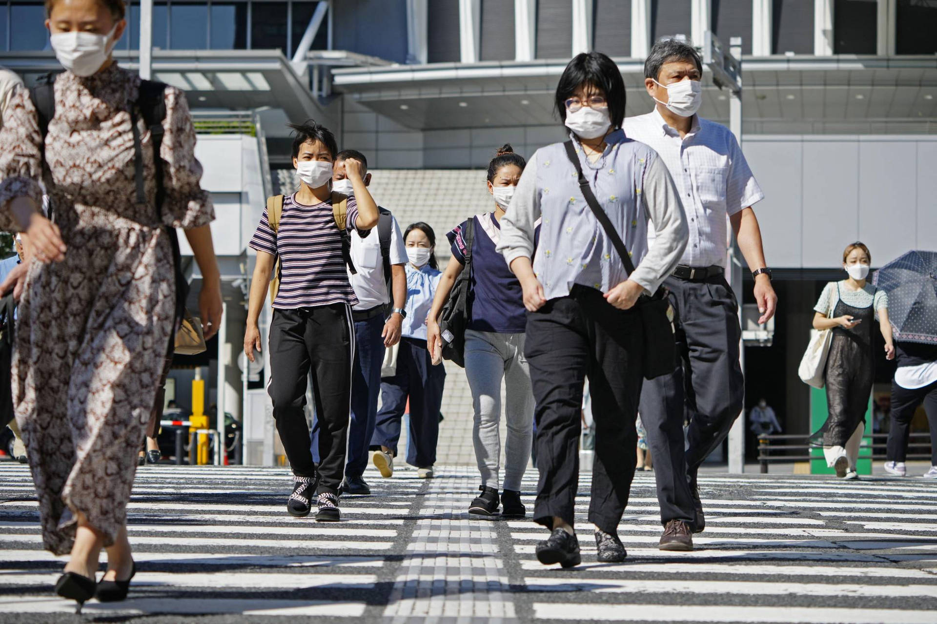 Professional Medical Team In Protective Gear Background