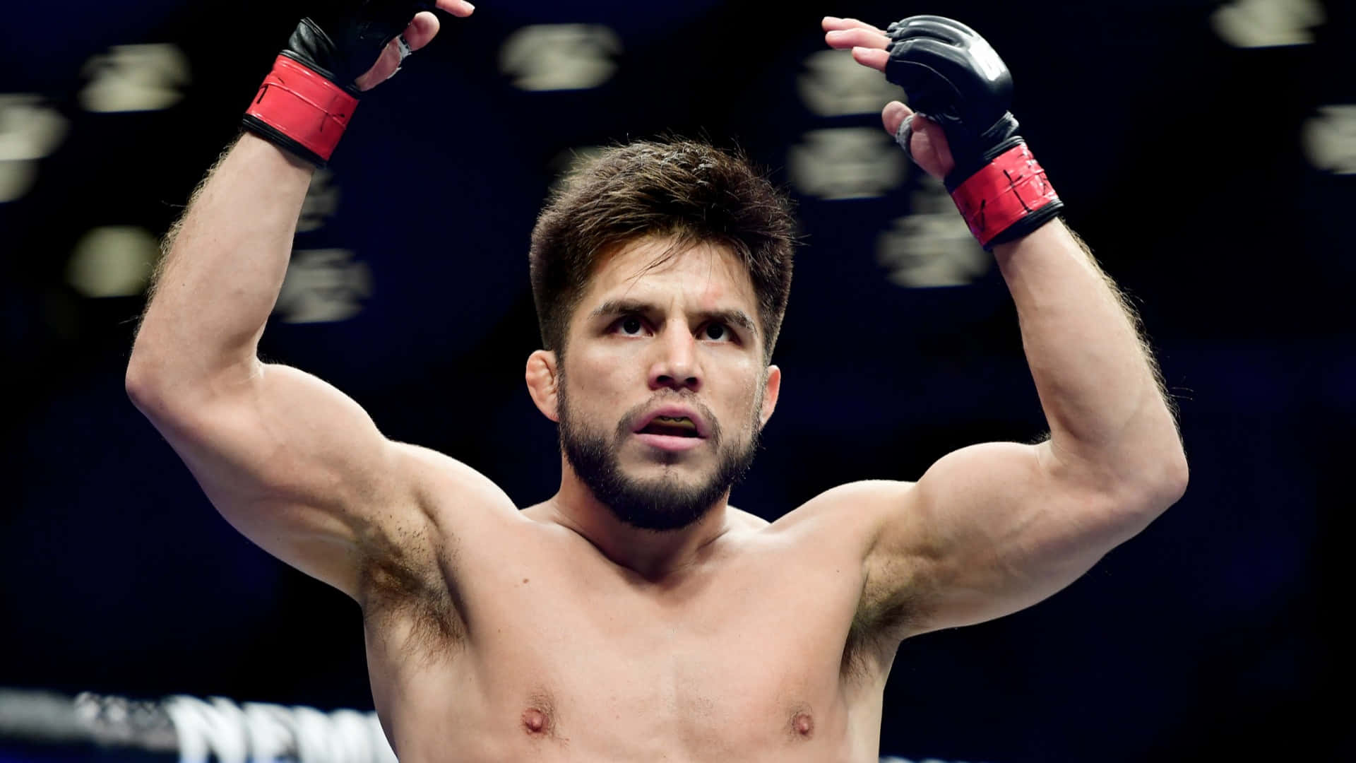 Professional Mma Fighter Henry Cejudo Standing Proudly In Barclays Center Background