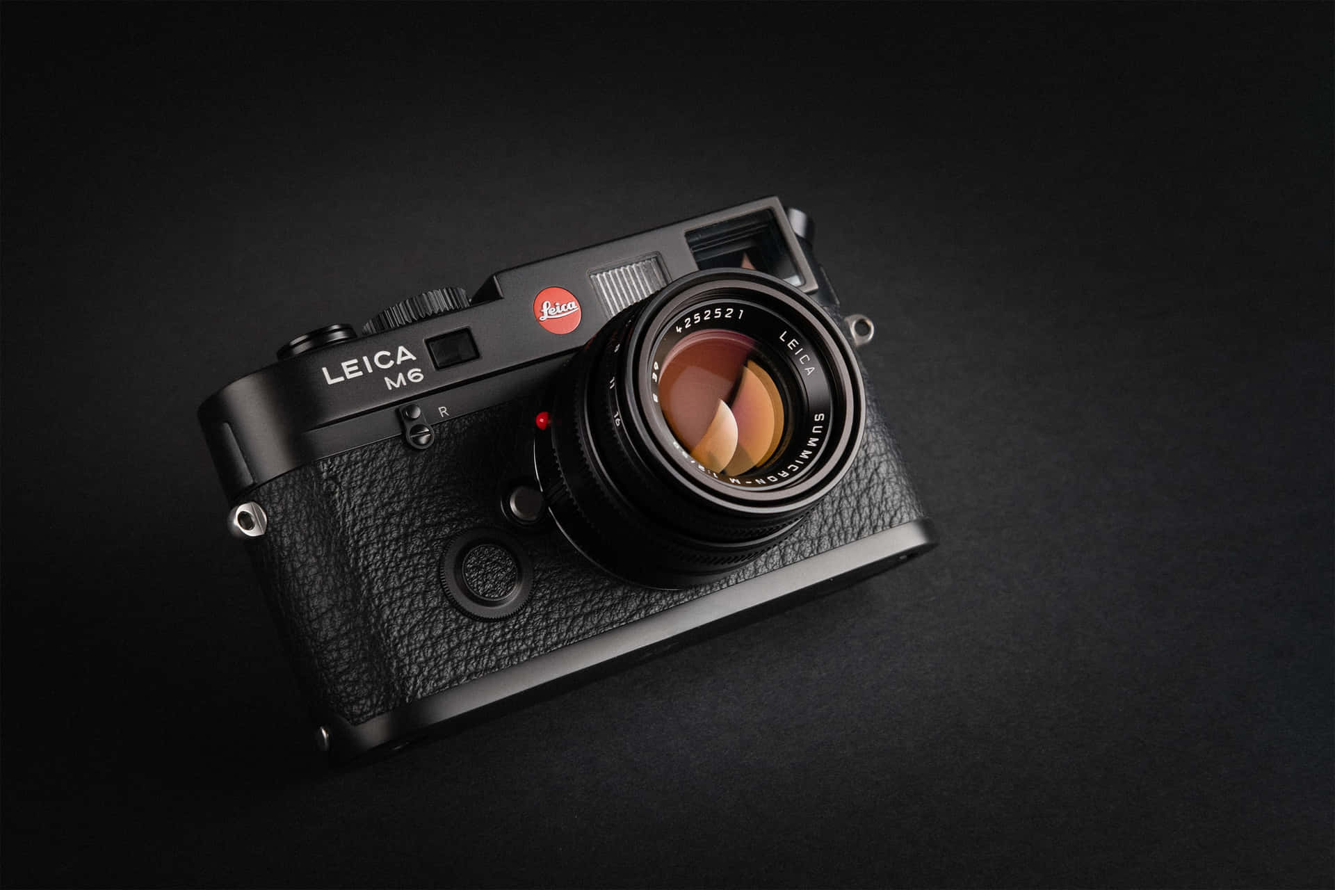 Professional Photography With Black Leica M6 Camera Background