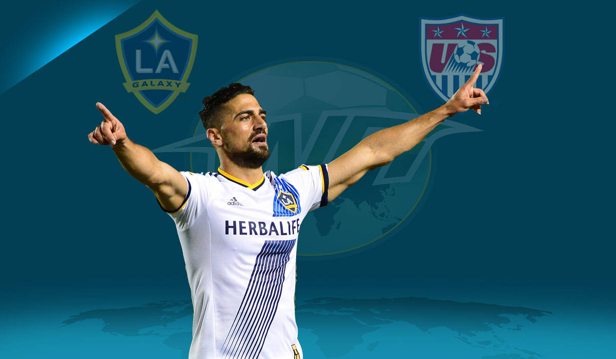 Professional Player Sebastian Lletget Pointing Background