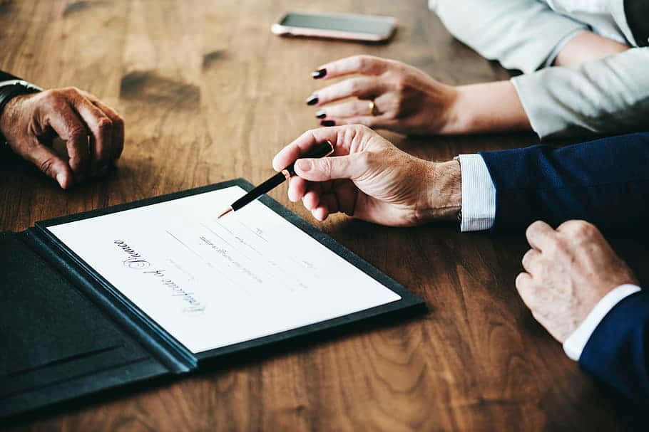 Professional Signing A Certified Document Background
