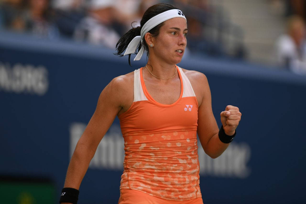 Professional Tennis Player Anastasija Sevastova Celebrating A Win Background