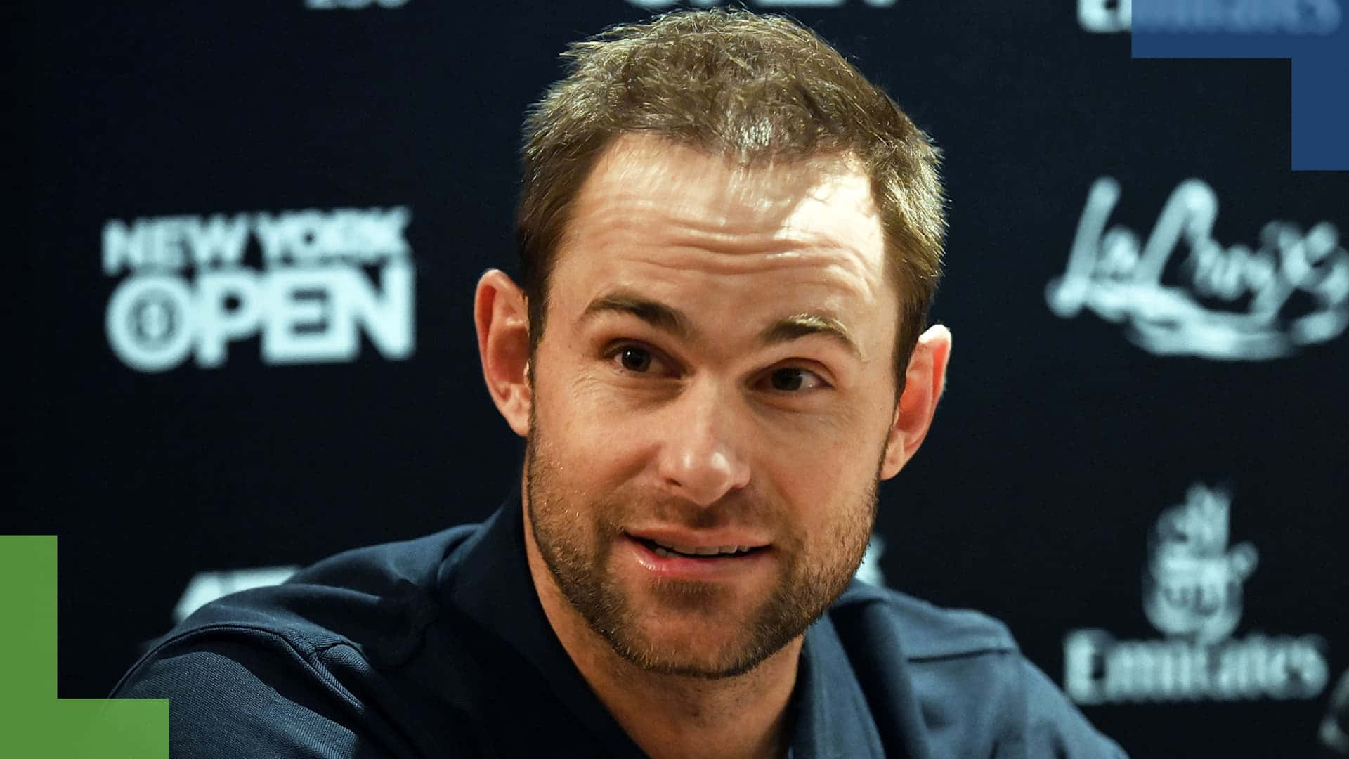 Professional Tennis Player Andy Roddick Smiling During An Interview