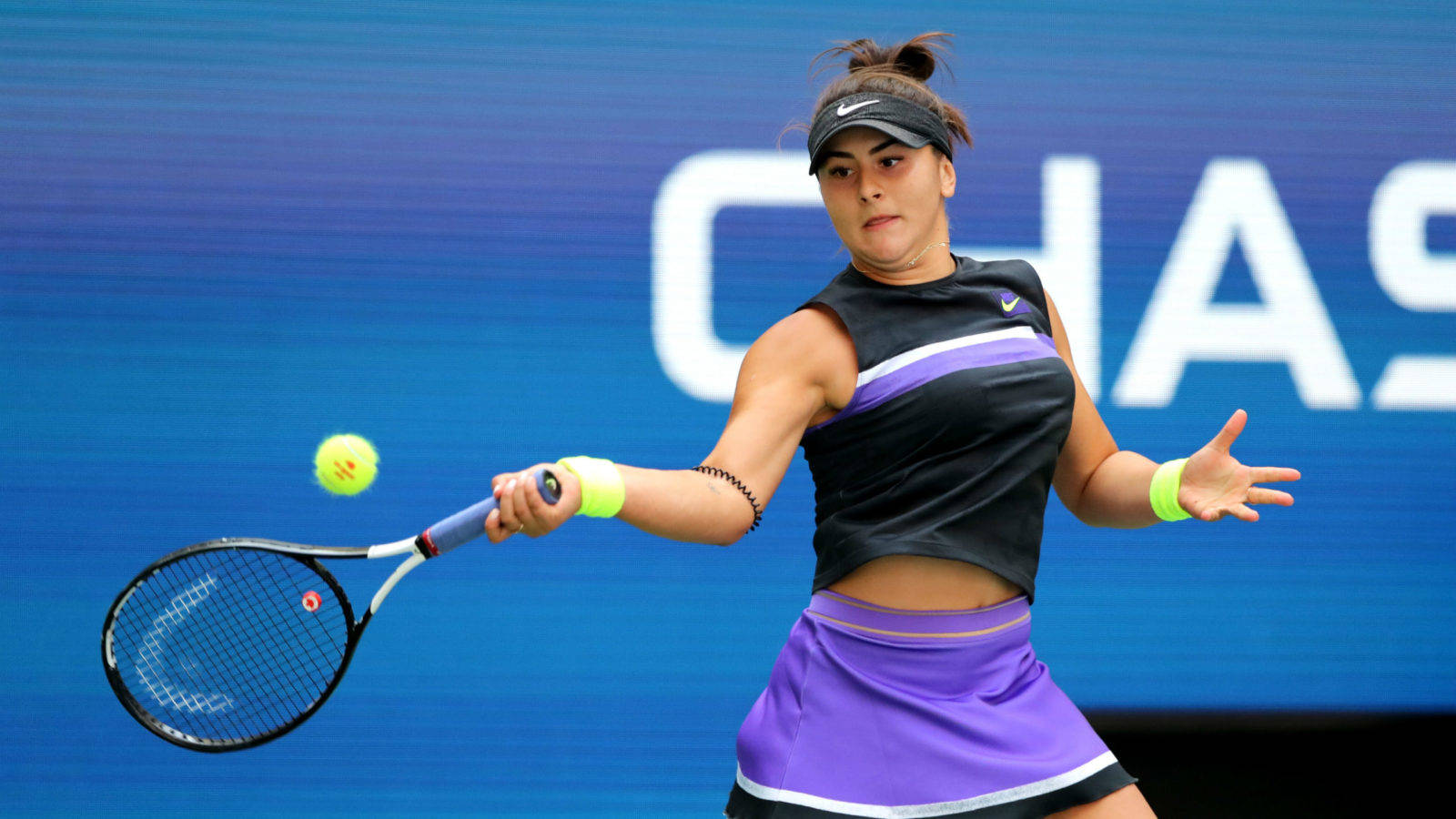 Professional Tennis Player - Bianca Andreescu In Action Background