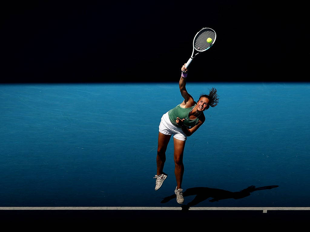 Professional Tennis Player Daria Kasatkina In Action Background