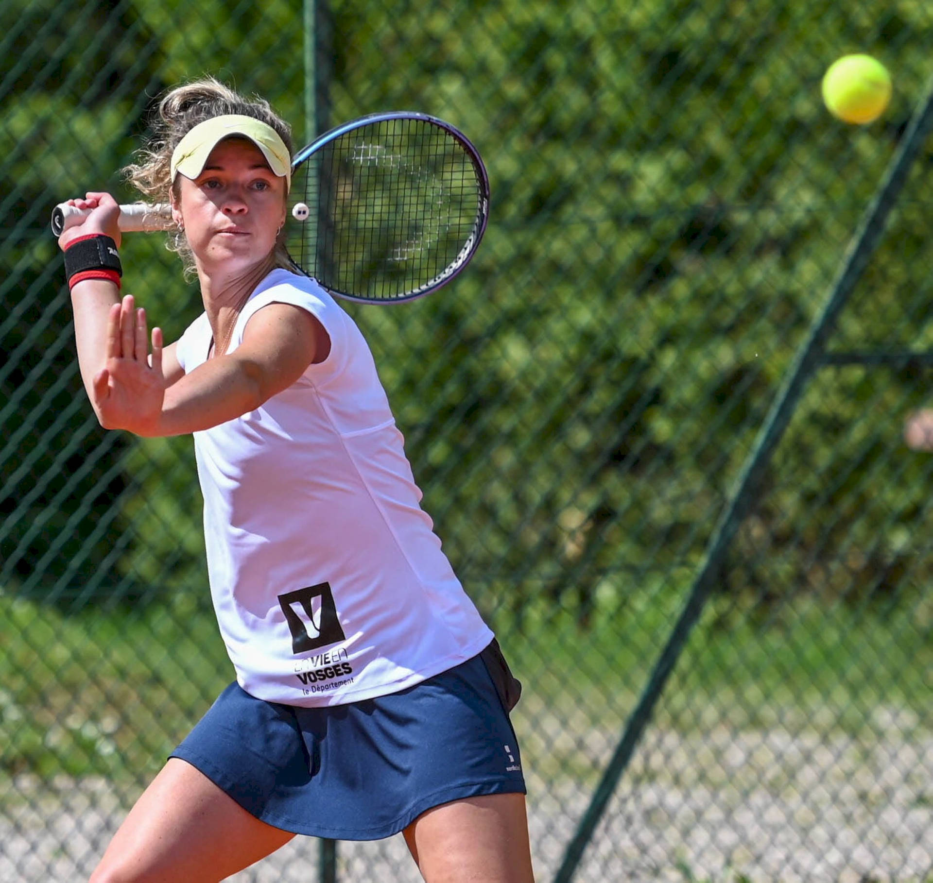 Professional Tennis Player Ekaterina Makarova In Action Background