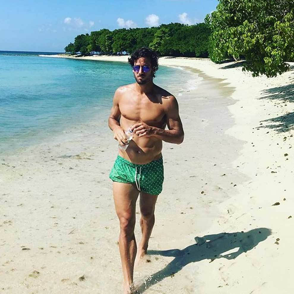 Professional Tennis Player Feliciano Lopez At Beach