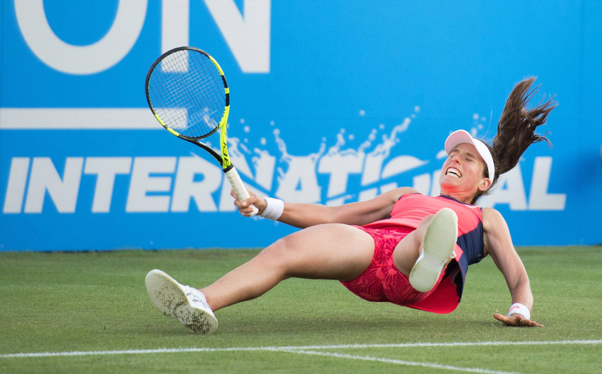 Professional Tennis Player Johanna Konta Trips On Court