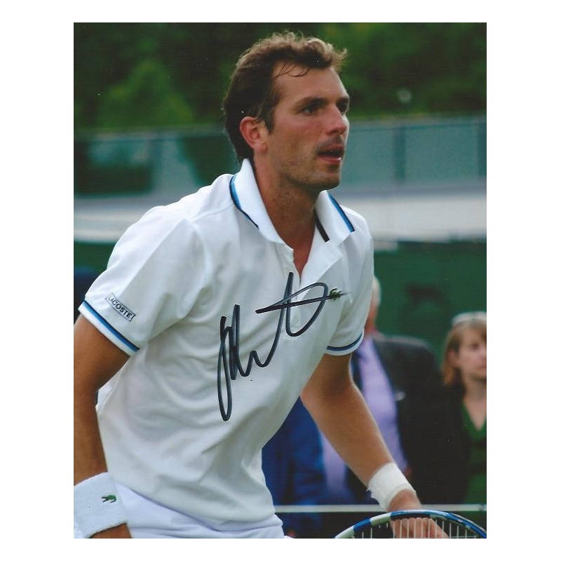 Professional Tennis Player Julien Benneteau In Action Background