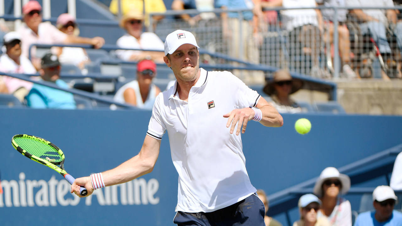 Professional Tennis Player, Sam Querrey, Masterfully Executing A Serve Background