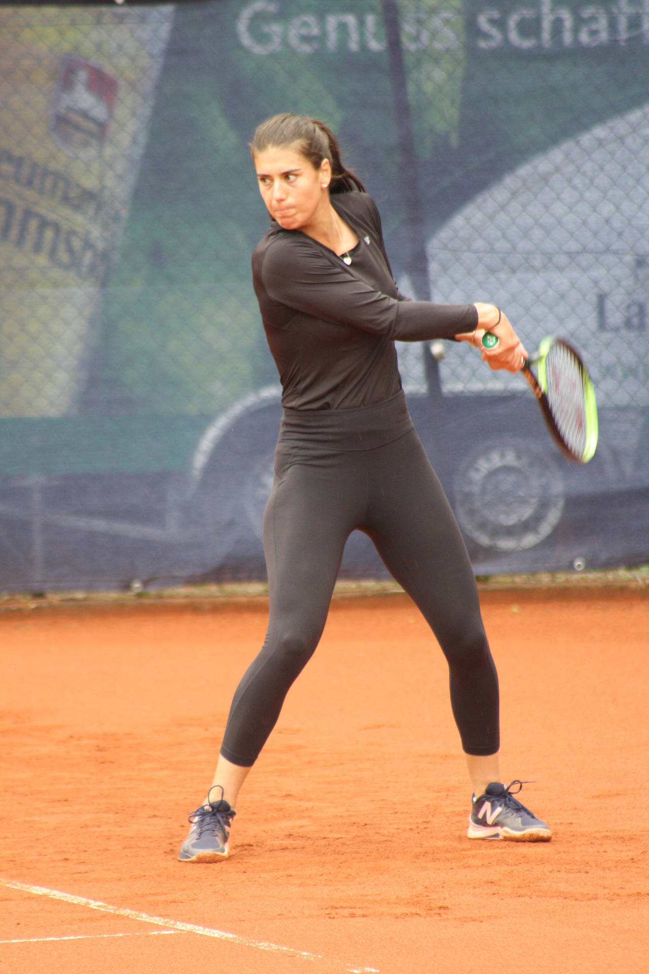 Professional Tennis Player Sorana Cirstea In Action Background