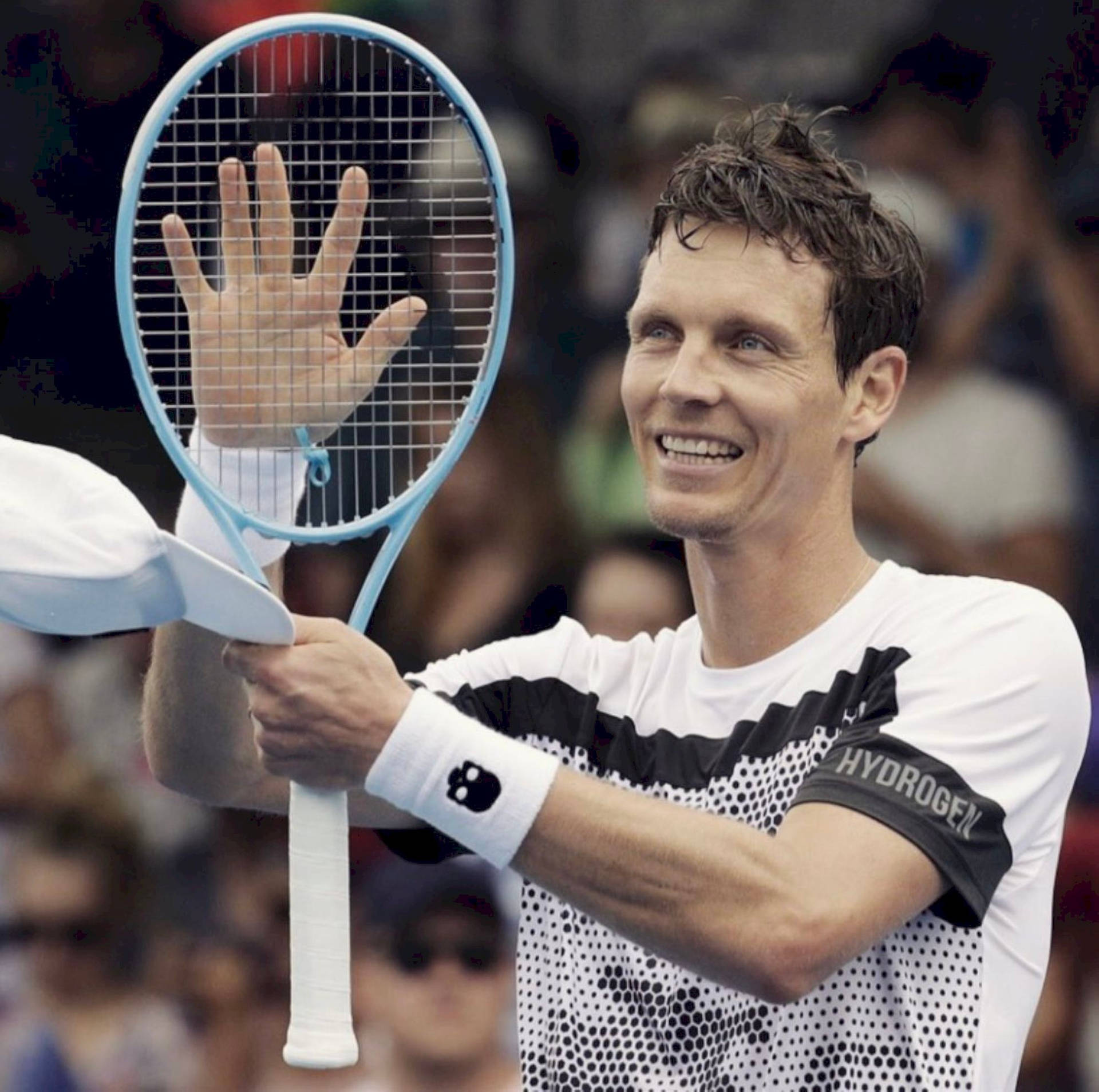 Professional Tennis Player Tomas Berdych Gripping Tennis Racket