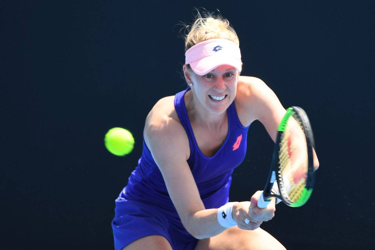 Professional Tennis Star Alison Riske-amritraj In A Blue Outfit Background