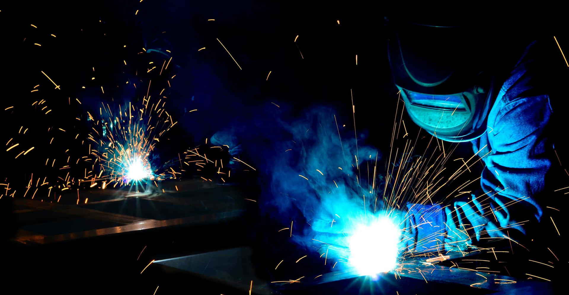 Professional Welder Working On A Joint Background