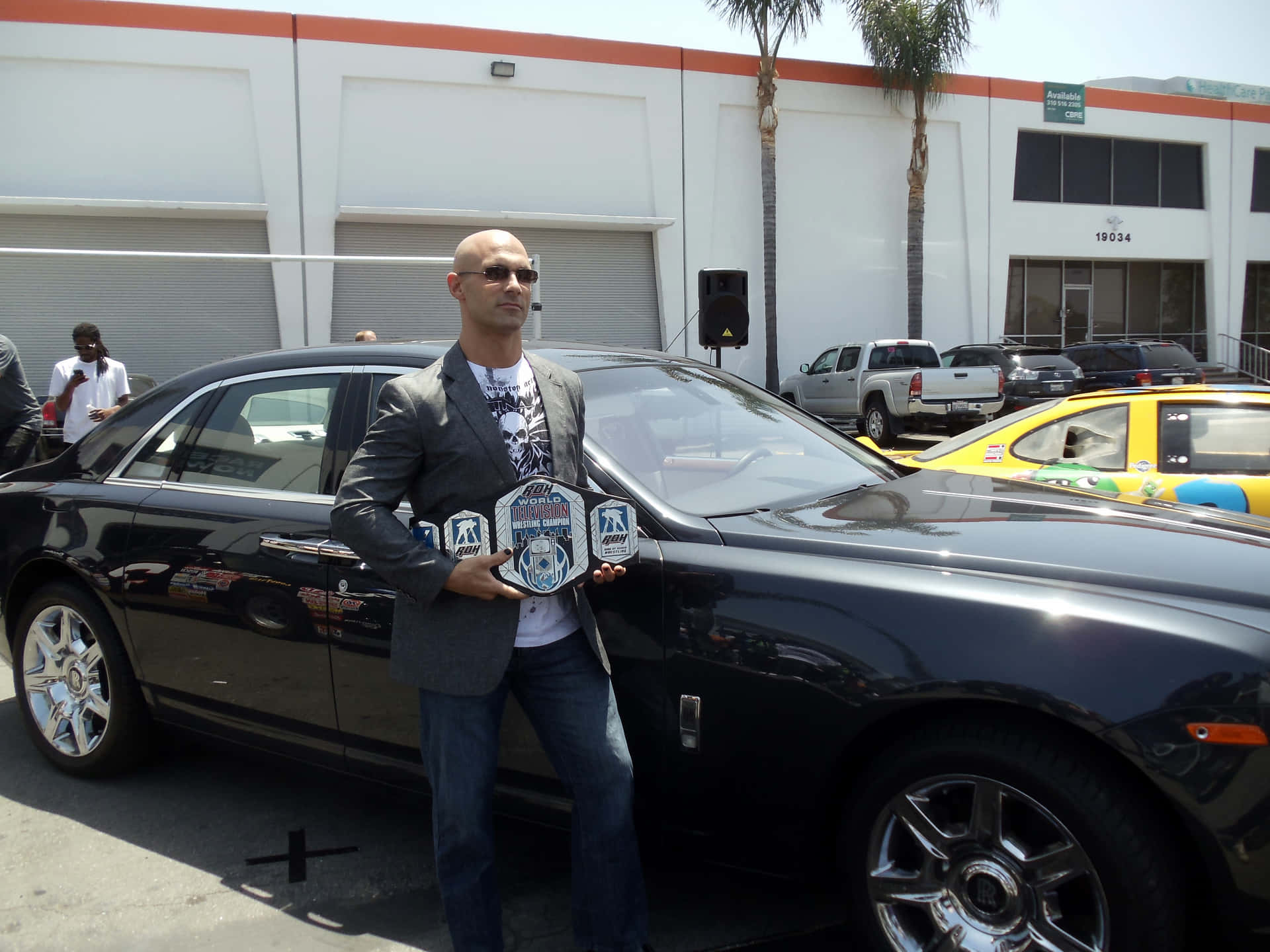Professional Wrestler Christopher Daniels At K1 Speed Indoor Racing Event Background