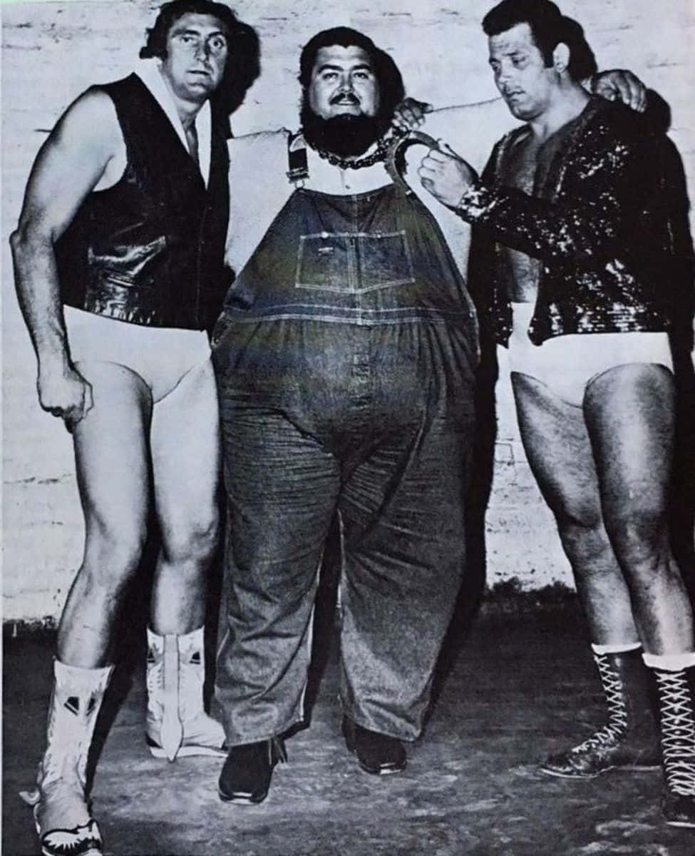 Professional Wrestler Haystacks Calhoun With Tex Mckenzie And Mario Milano Background