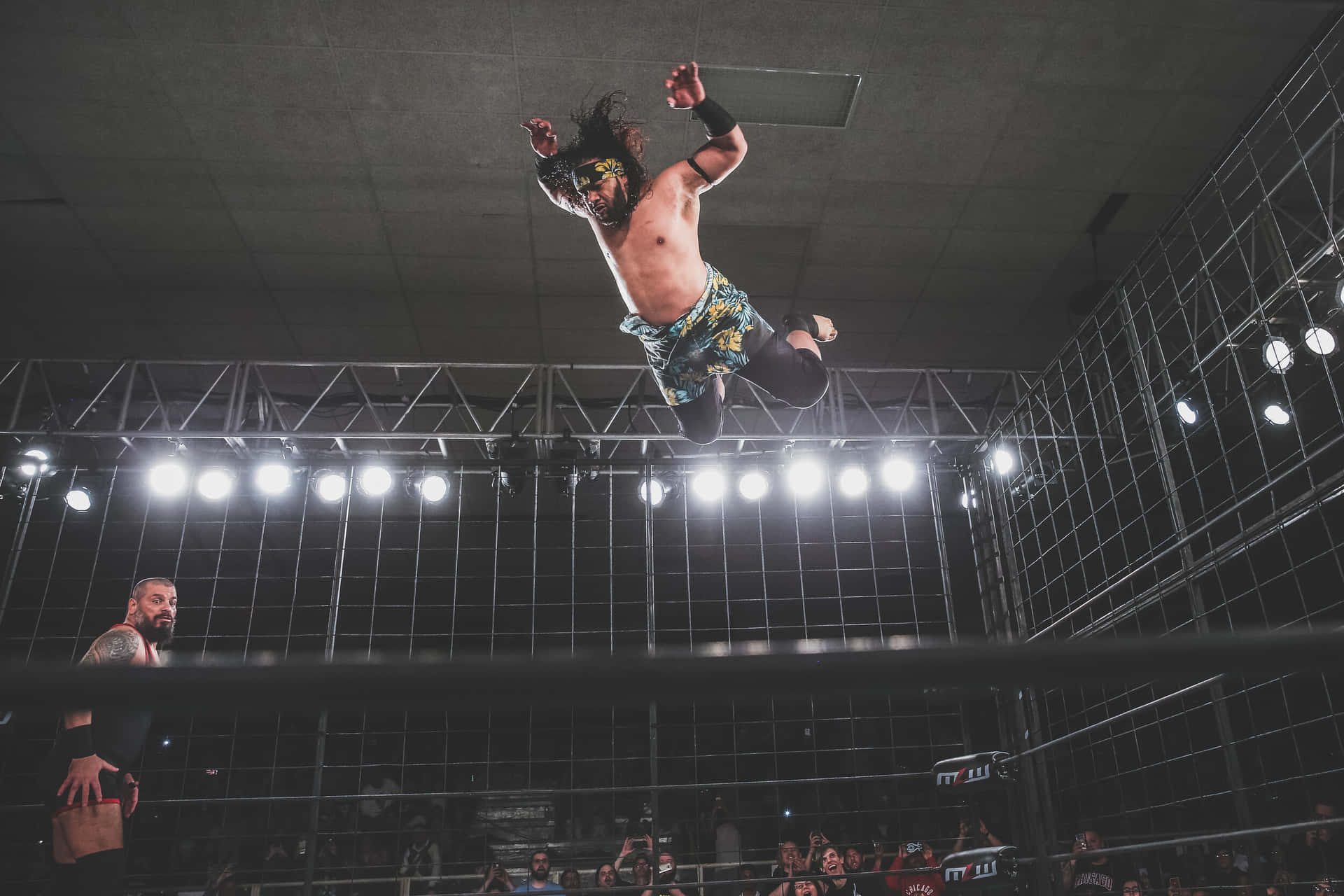 Professional Wrestler Heavyweight Jacob Fatu Frog Splash Background
