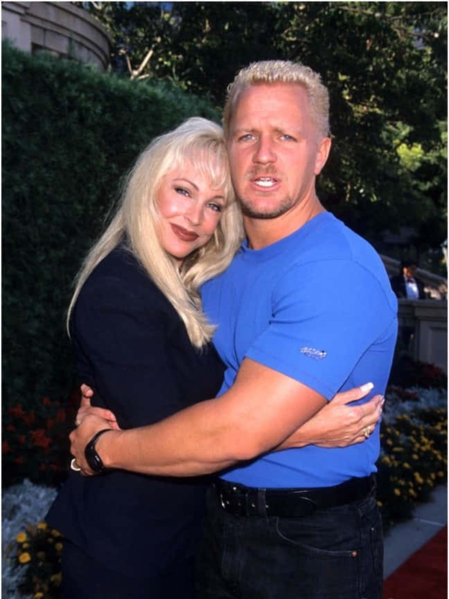 Professional Wrestler Jeff Jarrett With Karen Jarrett At A Wwe Event Background