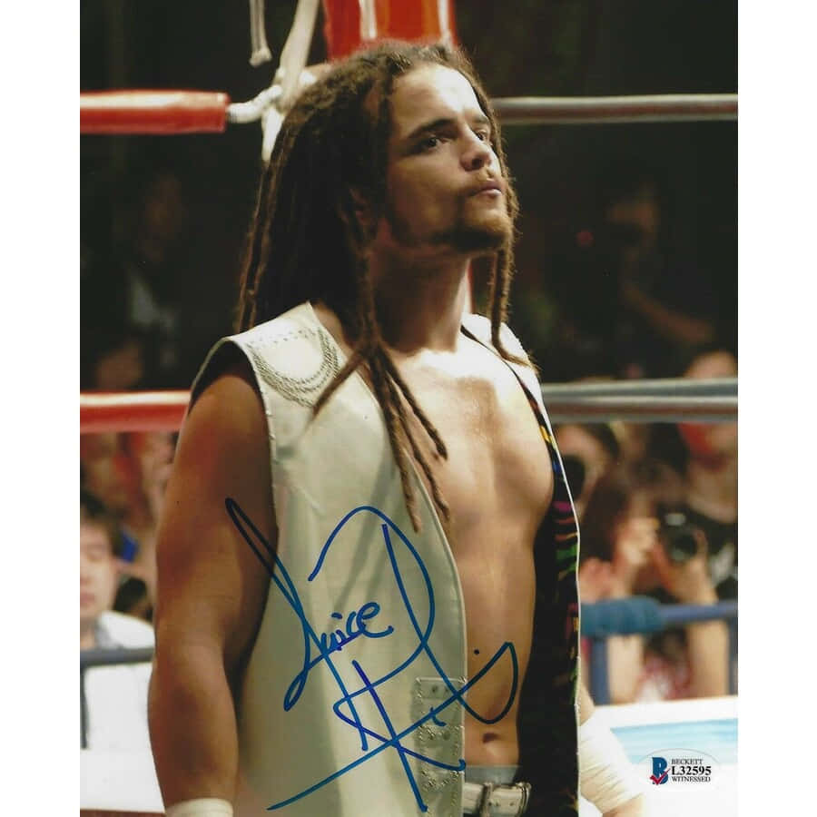 Professional Wrestler, Juice Robinson, Dressed In A White Blazer Background