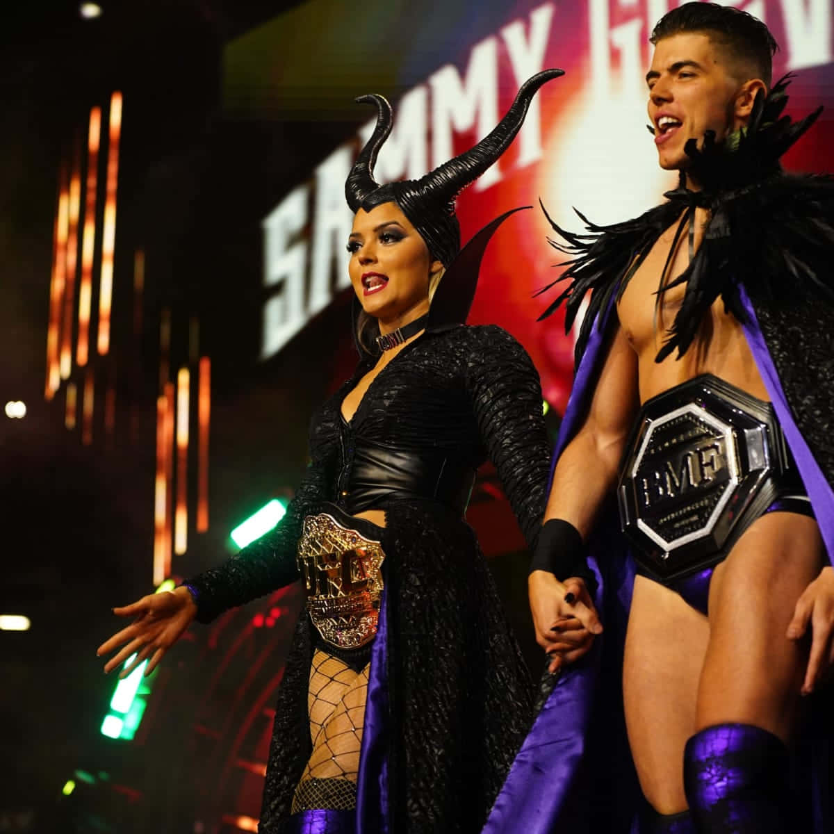 Professional Wrestler, Sammy Guevara, Posing With Tay Melo. Background