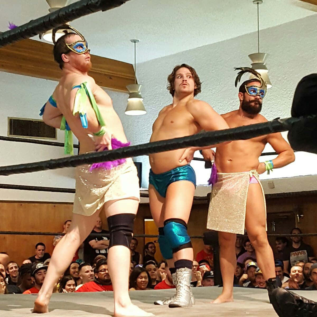 Professional Wrestlers Kyle O’reilly And Bobby Fish With Dalton Castle Background