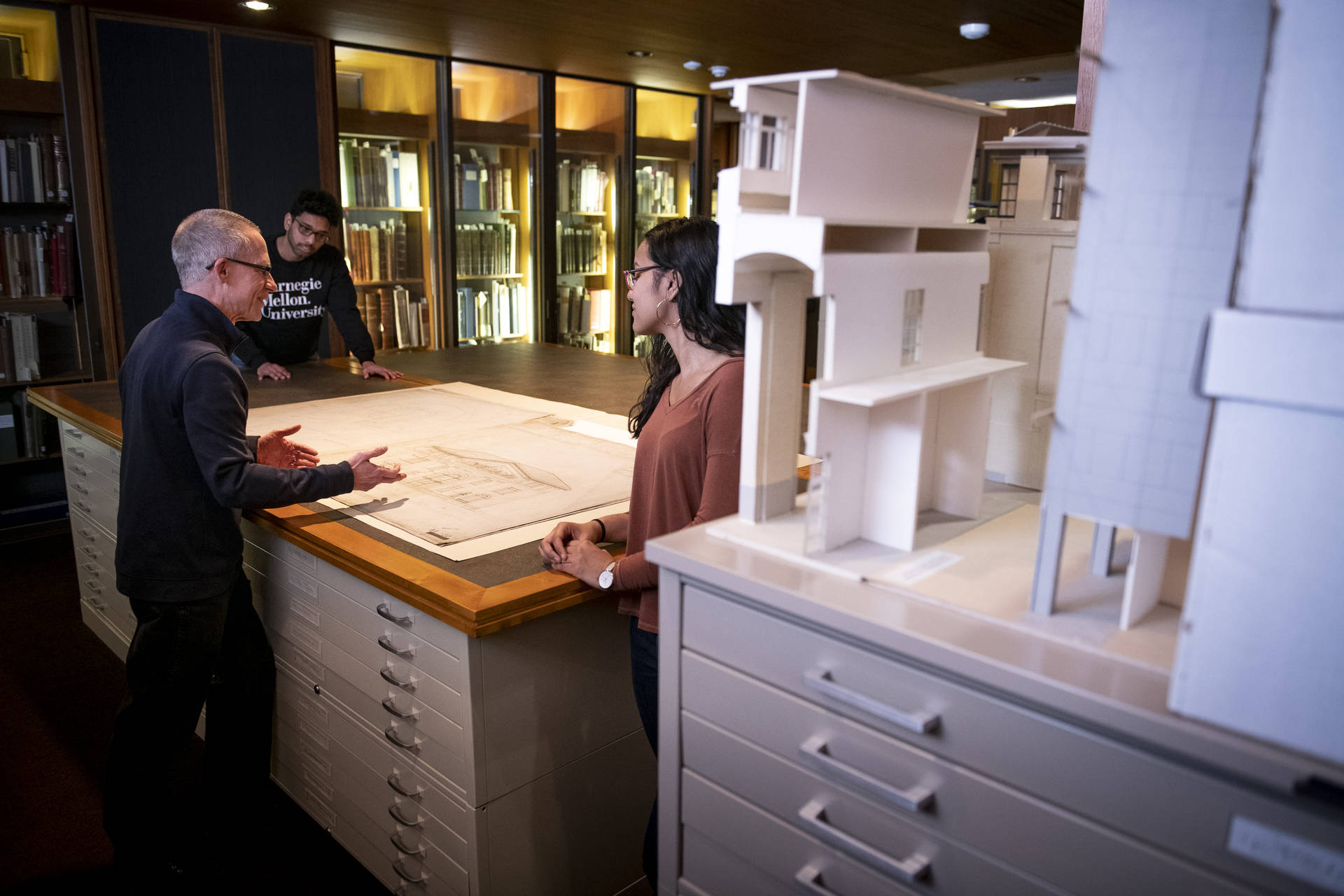 Professor With Students At Carnegie Mellon University Background