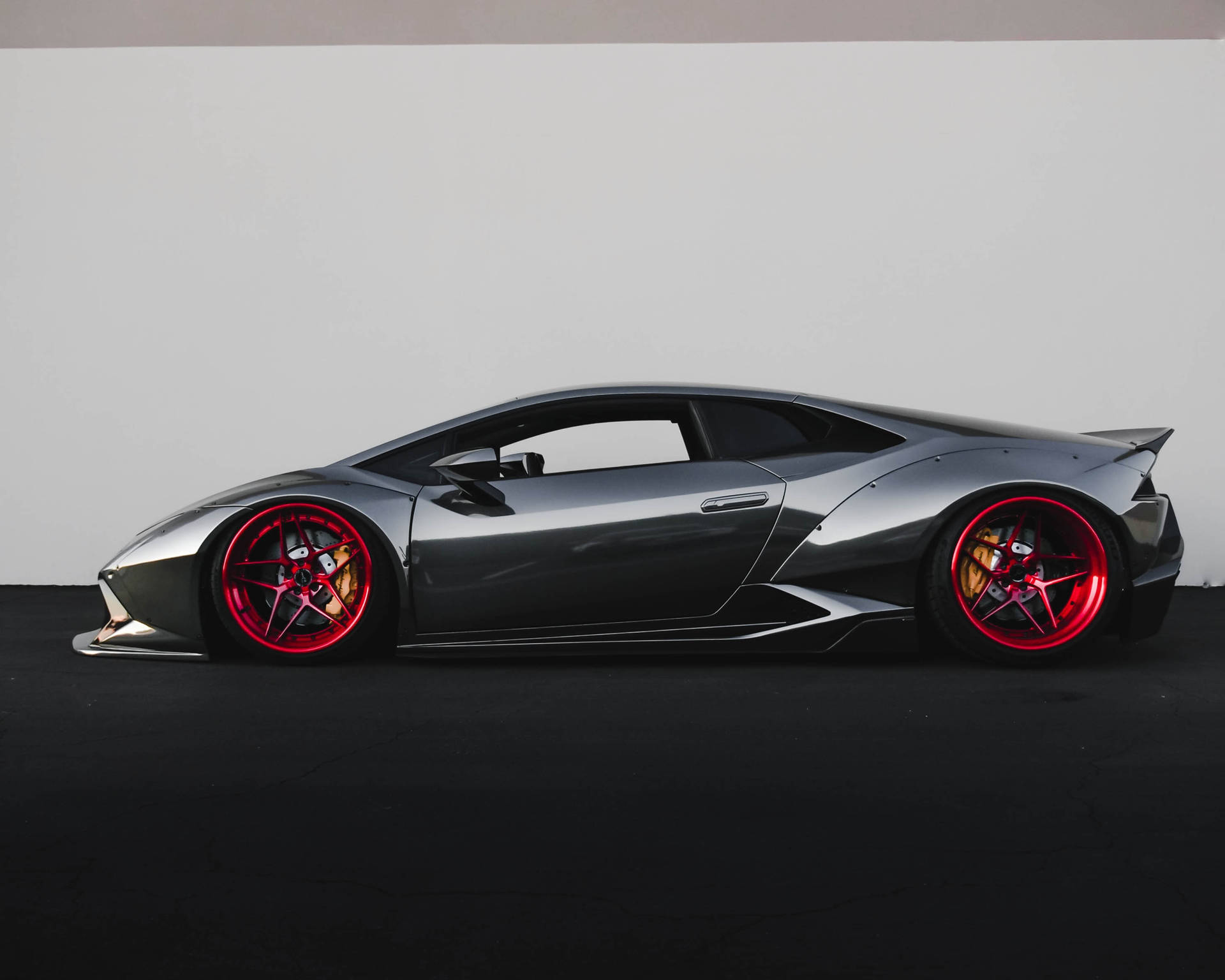 Profile Of Lamborghini Huracán Black Sports Cars Background