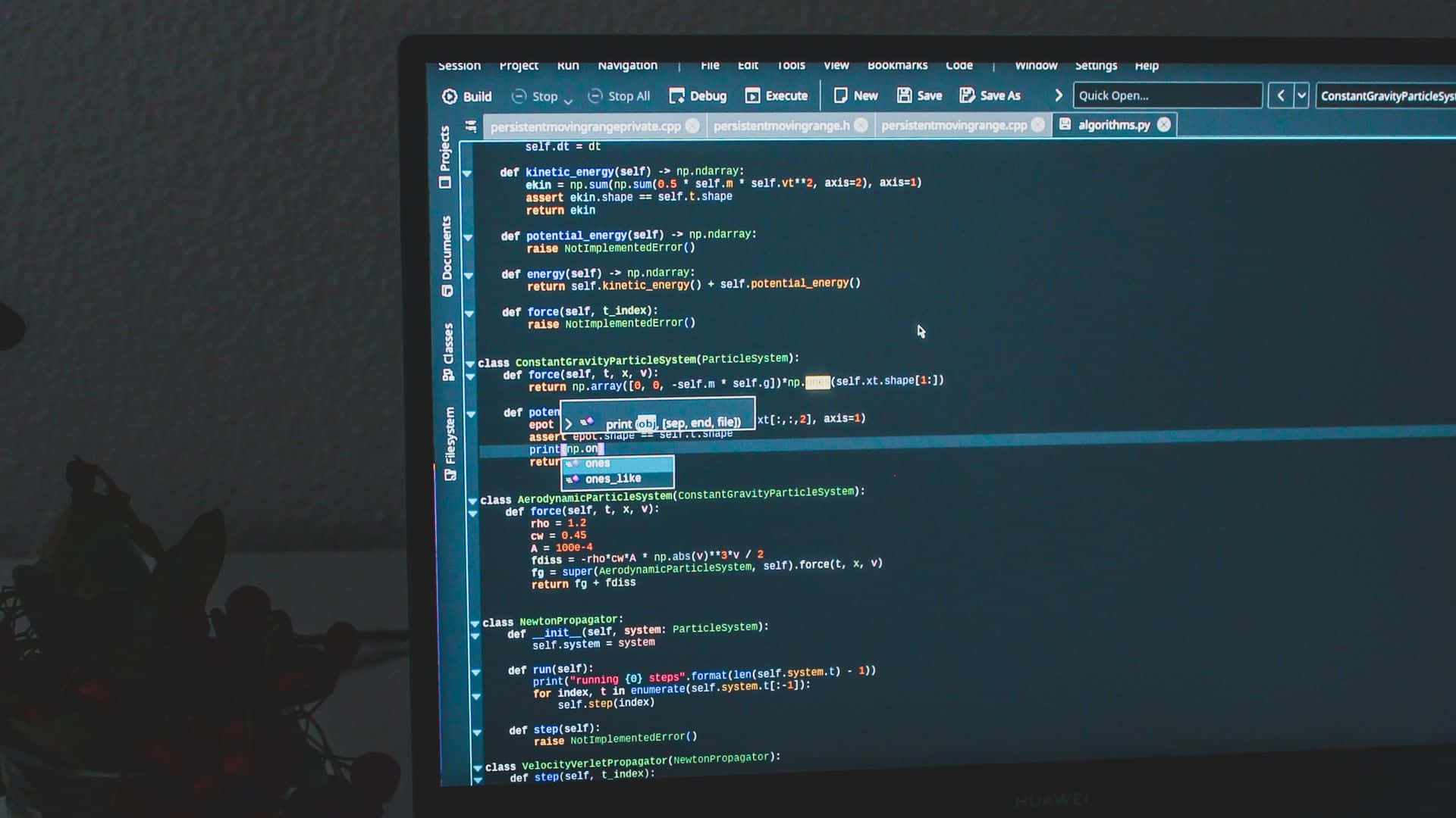 Programmer Writing Code At A Desk With Dual Monitors Background