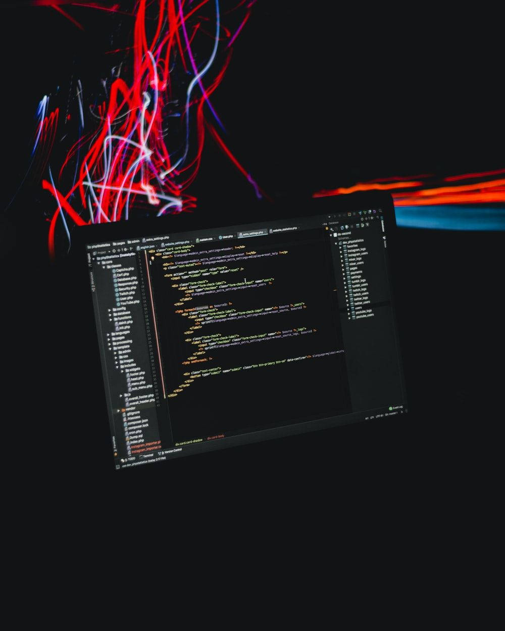 Programming Iphone Laptop With Codes And Wires Background