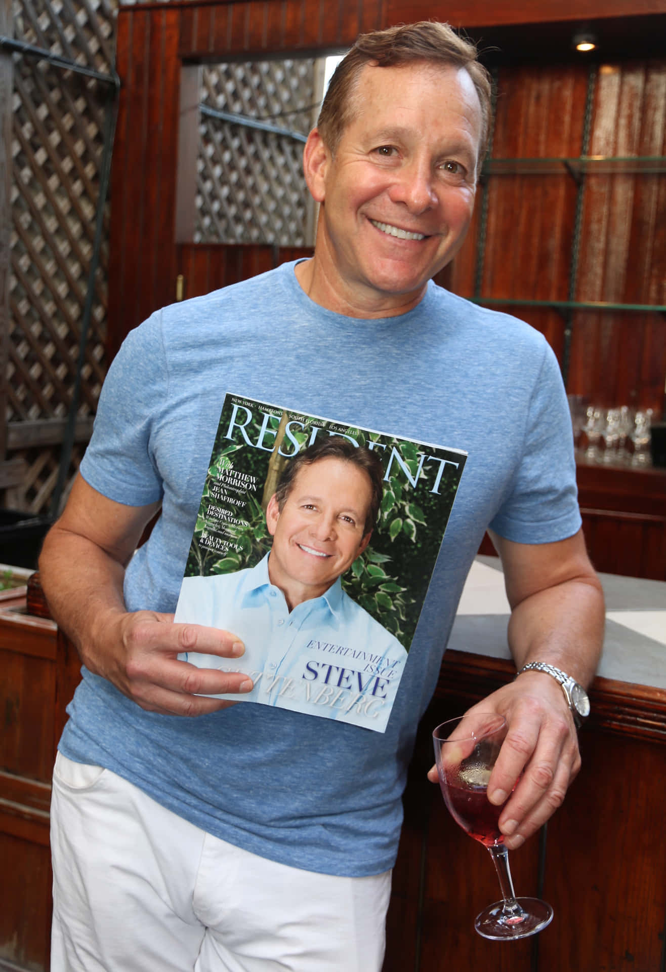 Prominent Actor Steve Guttenberg Captured In A Vivid Portrait Background