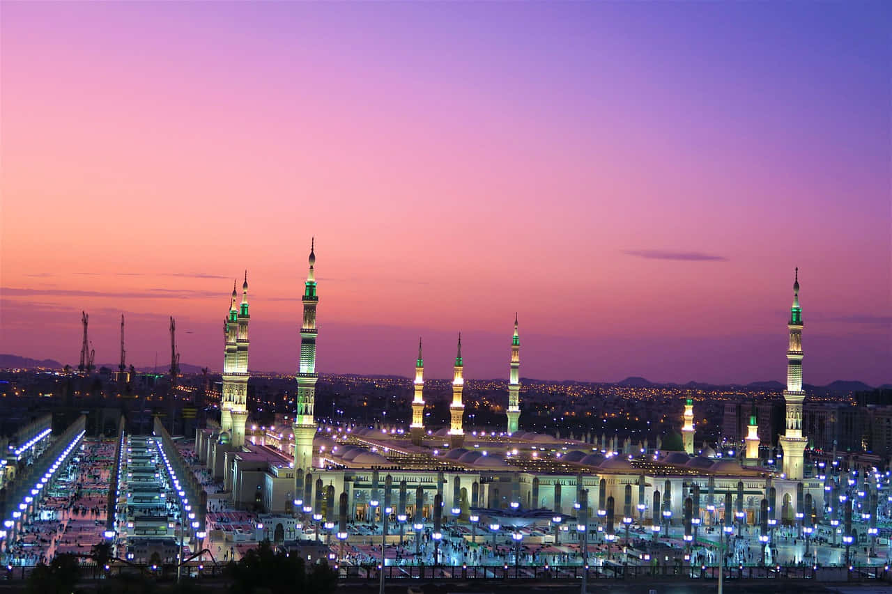 Prophet's Mosque At Twilight In Madina Background