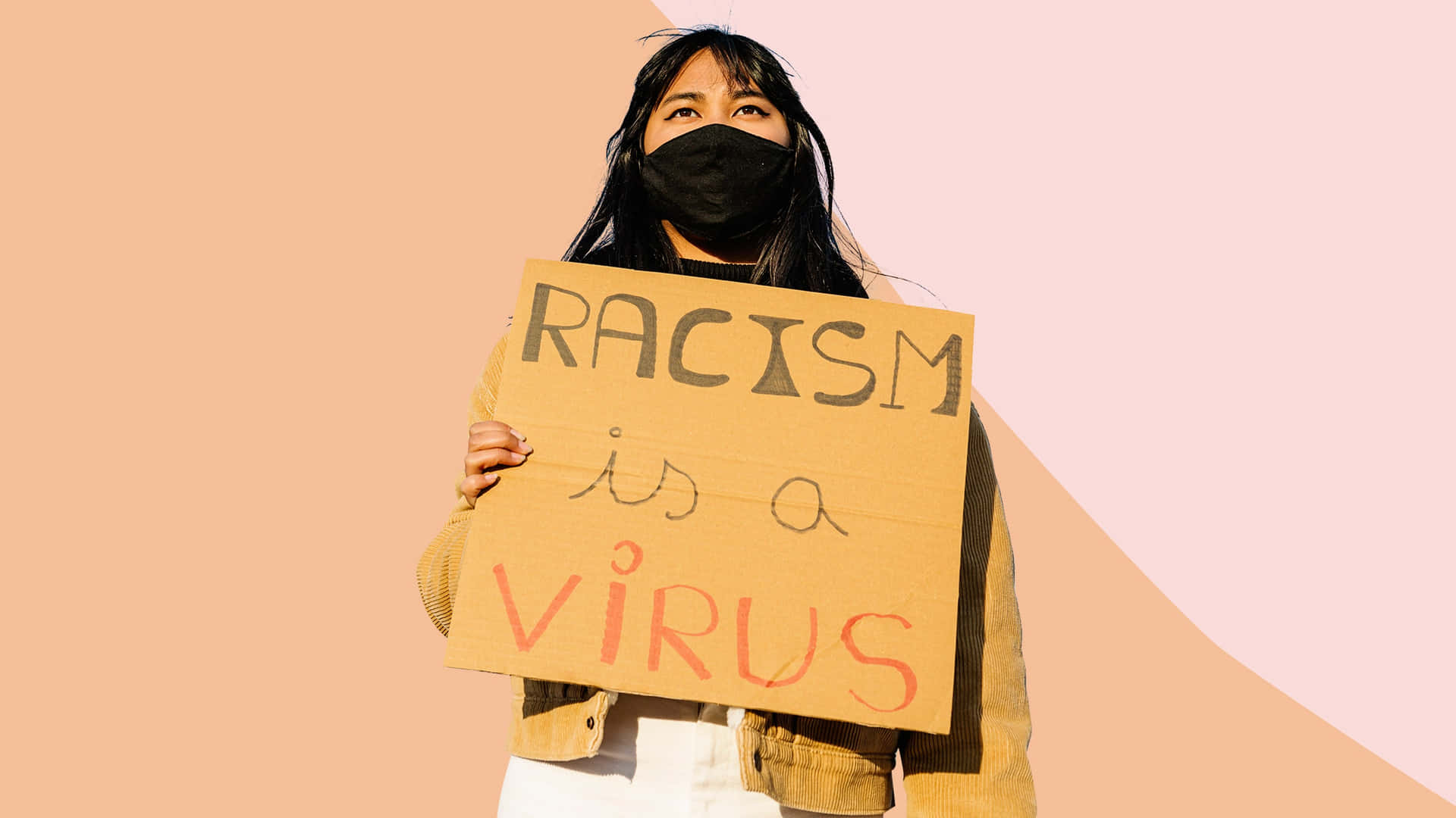 Protester Holding Sign Against Racism Background