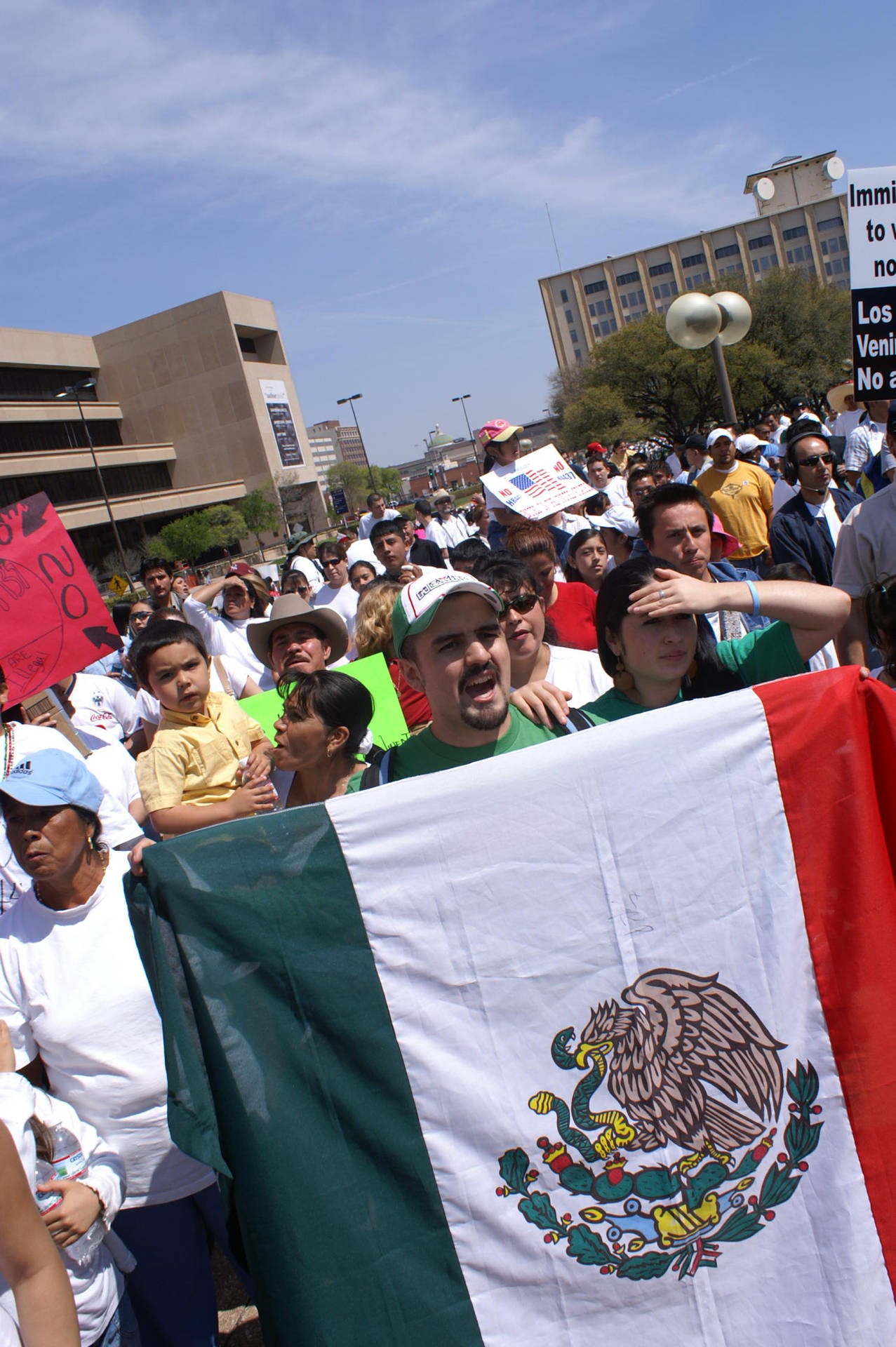 Protestors With A Mexico Flag Background
