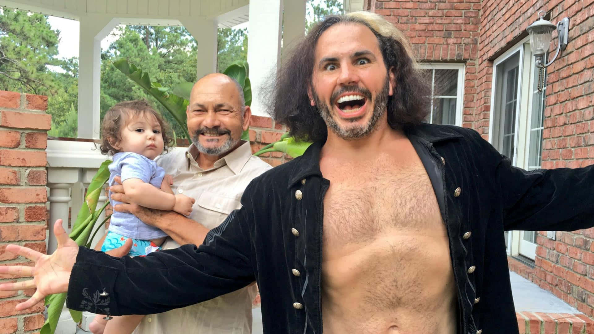 Proud Grandfather Jimmy Snuka Background