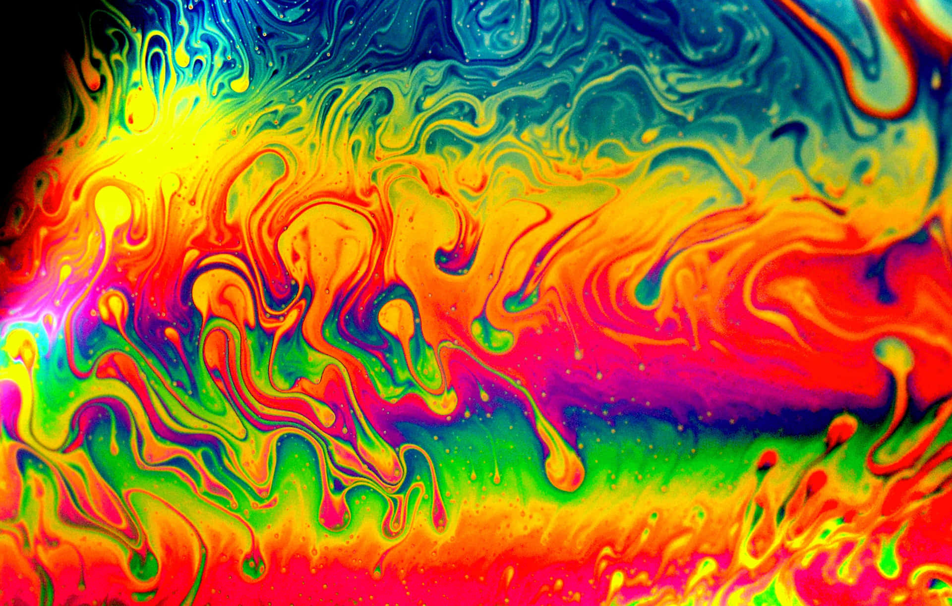 Psychedelic Colors Merge Together In A Mesmerizing Display Background