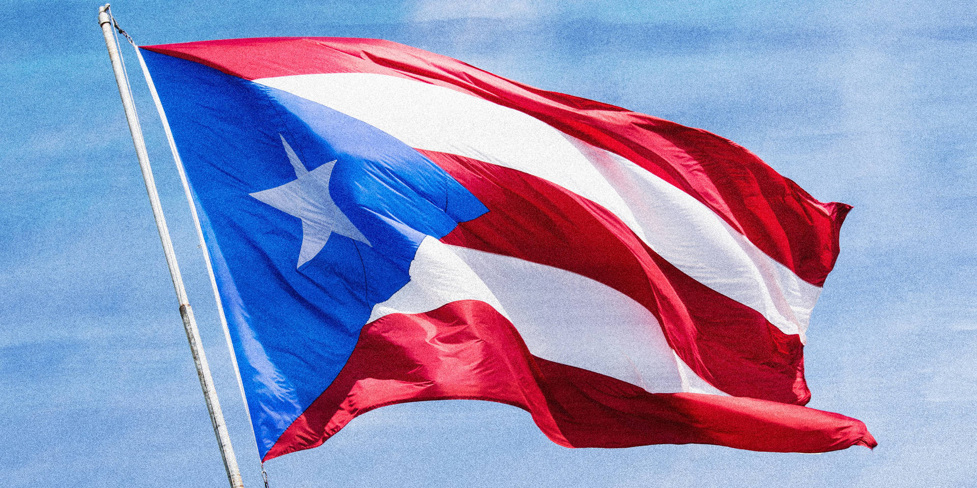 Puerto Rican Flag On White Pole Background