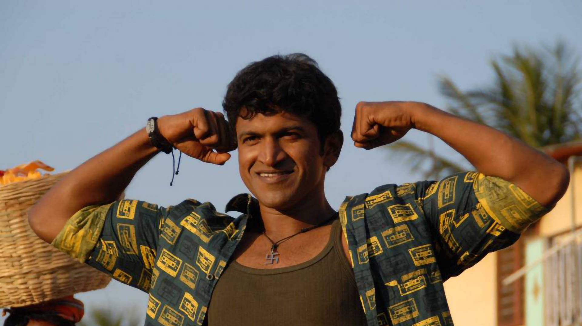 Puneeth Rajkumar Strong Biceps Background
