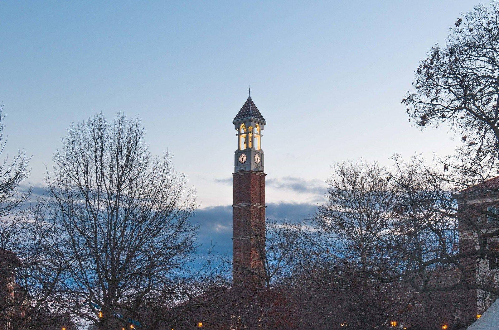 Purdue University Bell Tower At Sundown Background