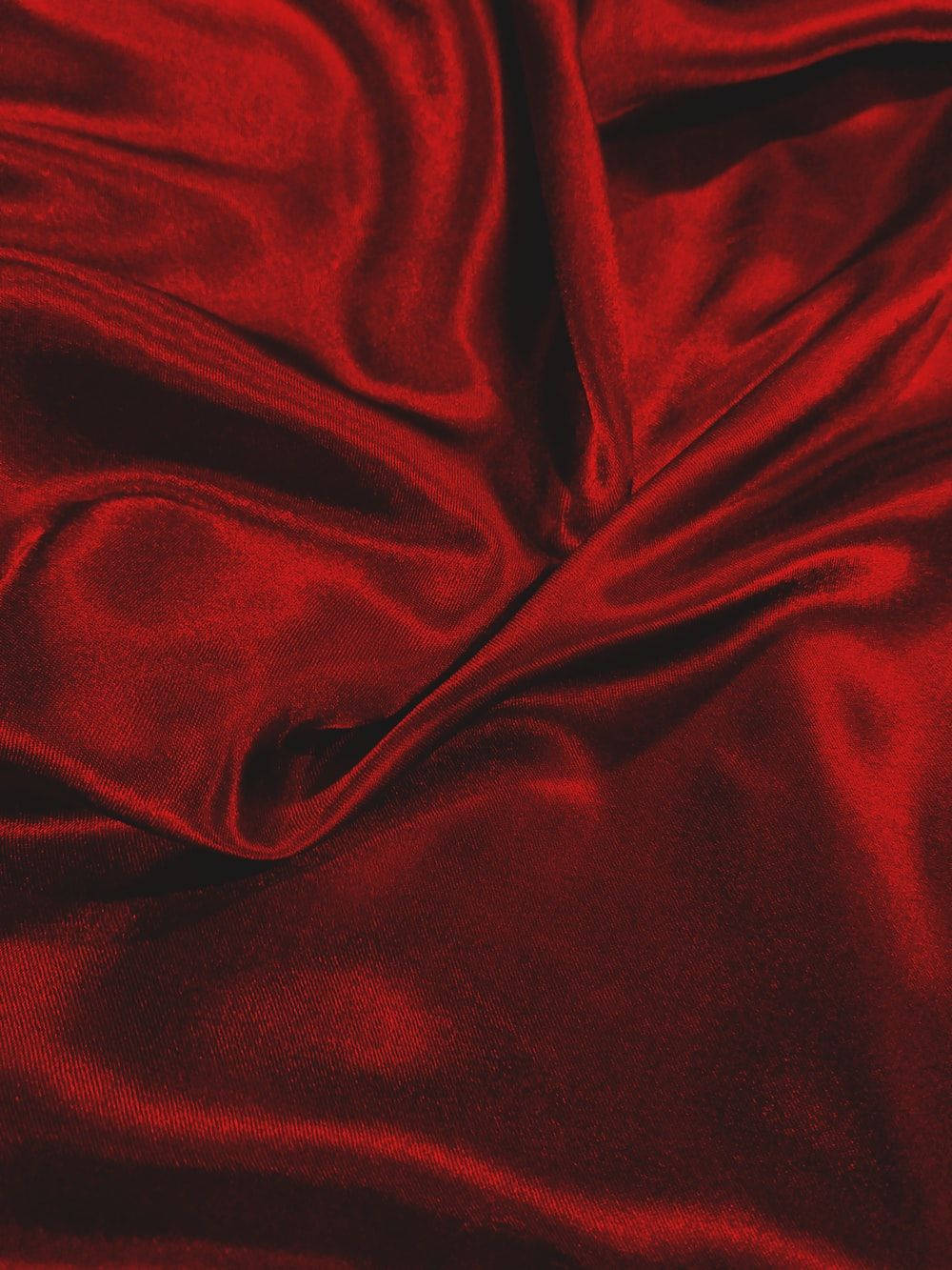 Pure Red Creased Silk Background