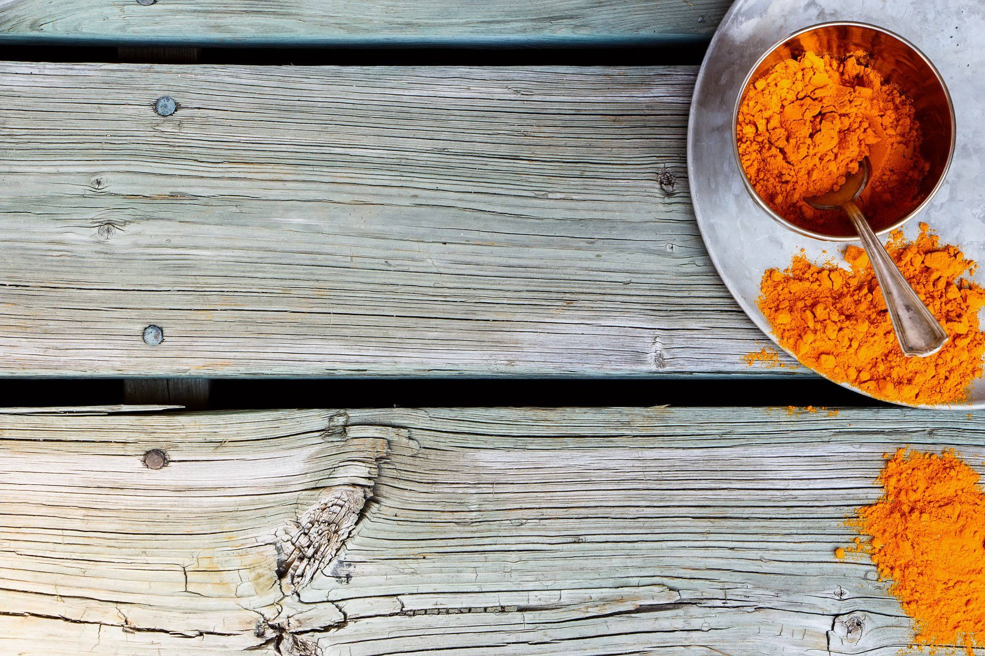 Pure Turmeric Powder In Its Vibrant Orange Glory