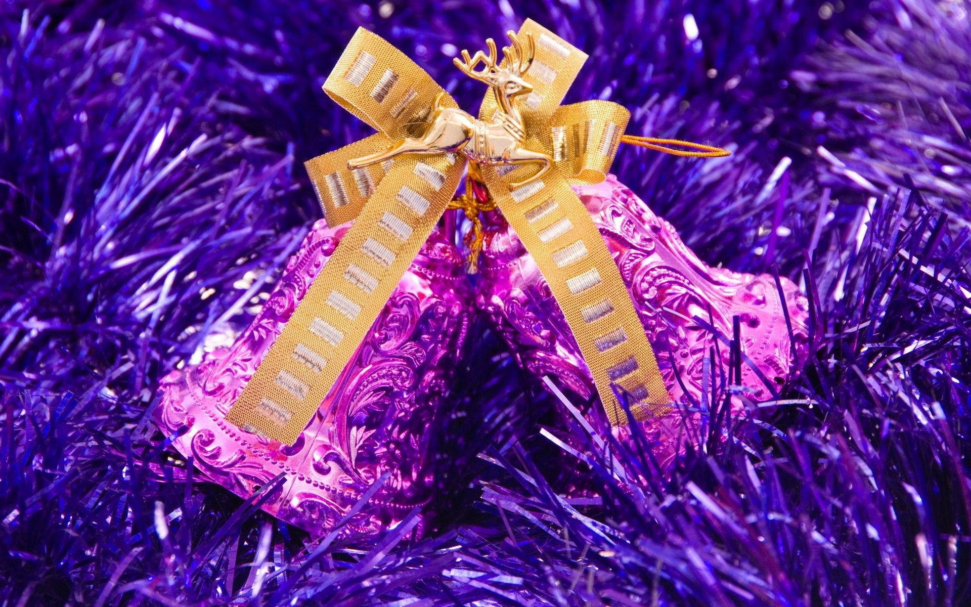 Purple Festive Bells With Gold Ribbon Background