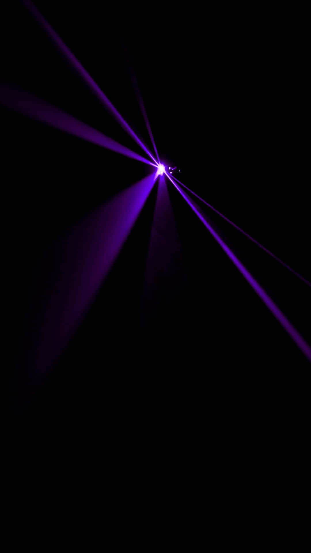 Purple Laser Beamsin Darkness Background