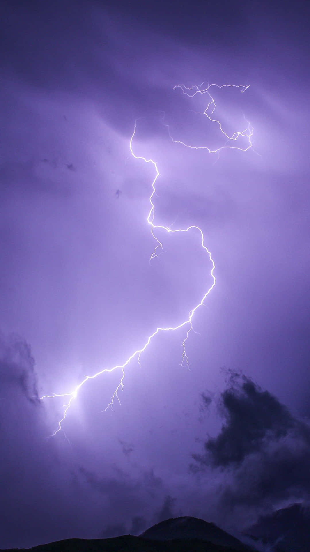 Purple Lightning In Night Sky Background