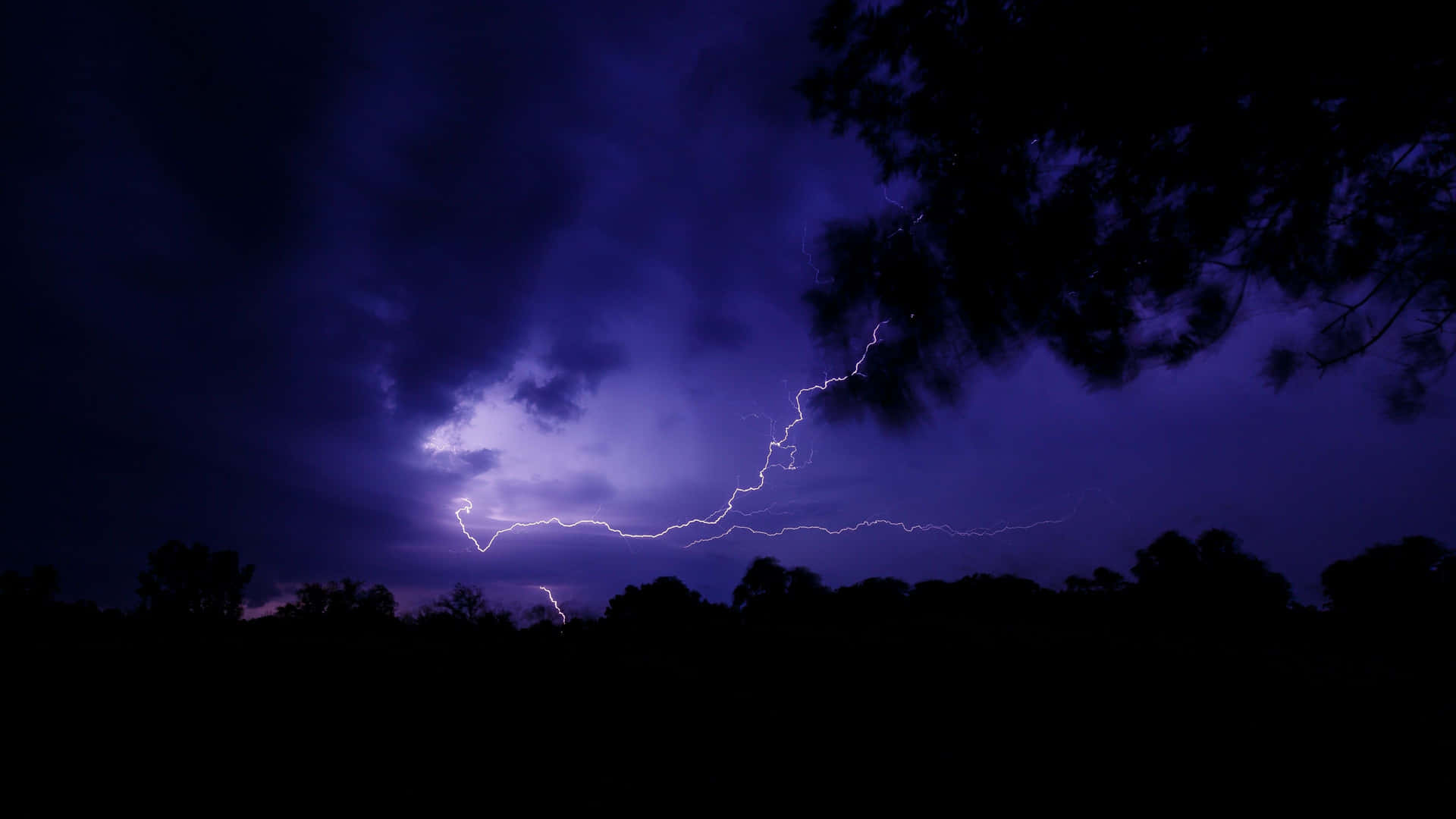 Purple Lightning With Dark Clouds