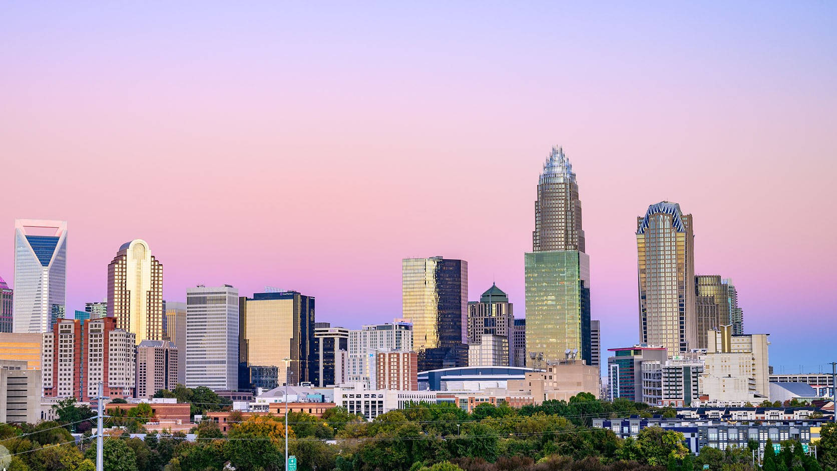 Purple Sky And Durham's Cityscape Background